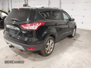 2014 Ford Escape Titanium with VIN 1FMCU9J96EUE26645, listed as a IAAI auction lot 41835893 with 83,730 mi miles. Bid and sale history available at carsss.com. Image 4.