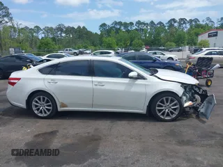 2013 Toyota Avalon XLE with VIN 4T1BK1EB4DU047982, listed as a IAAI auction lot 42011402 with 122,645 mi miles and . Bid and sale history available at DreamBid. Image 13.