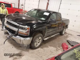 2016 Chevrolet Silverado 1500 LT with VIN 1GCVKREC5GZ176474, listed as a IAAI auction lot 41983780 with 118,587 mi miles and . Bid and sale history available at DreamBid. Image 2.