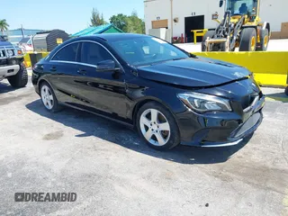 2019 Mercedes-Benz CLA with VIN WDDSJ4EB6KN744687, listed as a IAAI auction lot 42149392 with 98,635 mi miles. Bid and sale history available at carsss.com. Image 1.