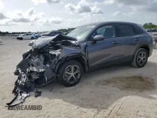 2023 Honda HR-V EX-L with VIN 3CZRZ1H71PM729808, listed as a Copart auction lot 59485675 with 12,703 mi miles and Salvage title. Bid and sale history available at DreamBid. Image 1.