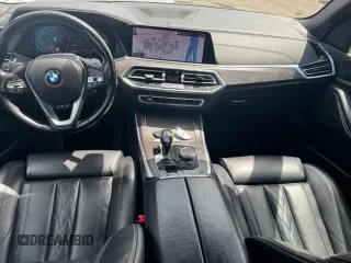 2019 BMW X5 xDrive40i z VIN 5UXCR6C58KLL13486, wystawiony jako Copart lot #59091415 z przebiegiem 152 342 mil mil oraz Tytuł czysty. Historia ofert i sprzedaży dostępna na DreamBid. Obrazek 9.