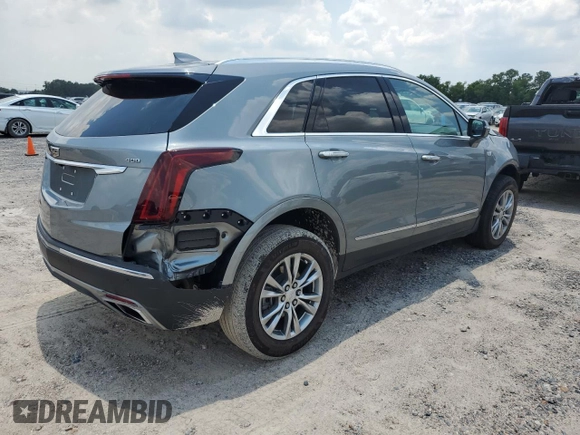 2023 Cadillac XT5 FWD Premium Luxury with VIN 1GYKNCRS3PZ135585, listed as a Copart auction lot 58891914 with 32,325 mi miles and Salvage Title. Bid and sale history available at carsss.com. Image 3.