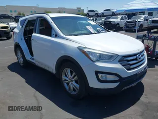2013 Hyundai Santa Fe Sport z VIN 5XYZUDLAXDG053926, wystawiony jako IAAI lot #42068307 z przebiegiem 147 402 mil mil oraz . Historia ofert i sprzedaży dostępna na DreamBid. Obrazek 1.