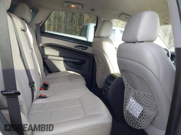 2014 Cadillac SRX with VIN 3GYFNAE39ES688059, listed as a IAAI auction lot 41408062 with 192,770 mi miles and . Bid and sale history available at DreamBid. Image 8.