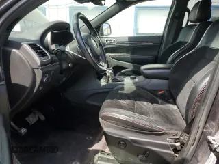 2017 Jeep Grand Cherokee Trailhawk with VIN 1C4RJFLGXHC654112, listed as a Copart auction lot 56397195 with 168,136 mi miles and Salvage title. Bid and sale history available at DreamBid. Image 7.