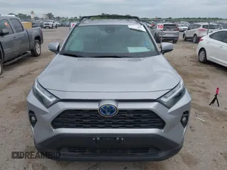 2023 Toyota RAV4 Hybrid XLE Premium z VIN 4T3B6RFV2PU138031, wystawiony jako IAAI lot #42127990 z przebiegiem 14 191 mil mil oraz . Historia ofert i sprzedaży dostępna na DreamBid. Obrazek 12.