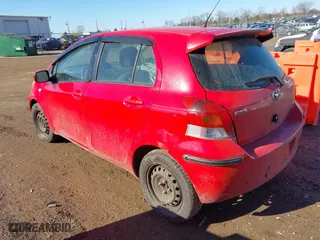 2009 Toyota Yaris with VIN JTDKT903495259976, listed as a IAAI auction lot 41670039 with 183,046 mi miles. Bid and sale history available at carsss.com. Image 3.