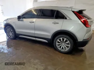 2022 Cadillac XT4 FWD Premium Luxury with VIN 1GYFZCR47NF100232, listed as a Copart auction lot 54520405 with 68,819 mi miles and Clean title. Bid and sale history available at DreamBid. Image 2.