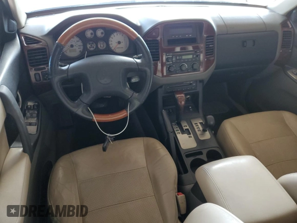 2006 Mitsubishi Montero Limited z VIN JA4MW51SX6J003398, wystawiony jako Copart lot #70511684 z przebiegiem 167 981 mil mil oraz Tytuł czysty. Historia ofert i sprzedaży dostępna na DreamBid. Obrazek 8.
