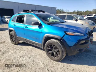 2018 Jeep Cherokee Trailhawk with VIN 1C4PJMBB2JD529915, listed as a Copart auction lot 87686525 with 107,184 mi miles and Salvage Title. Bid and sale history available at carsss.com. Image 4.