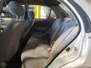 2002 Chevrolet Prizm z VIN 1Y1SK52862Z411433, wystawiony jako Copart lot #60319644 z przebiegiem 174 750 mil mil oraz Szkody całkowita. Historia ofert i sprzedaży dostępna na DreamBid. Obrazek 10.