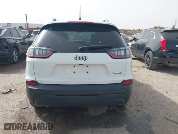2019 Jeep Cherokee Latitude Plus with VIN 1C4PJLLB0KD307741, listed as a IAAI auction lot 41750370 with 76,036 mi miles. Bid and sale history available at carsss.com. Image 16.