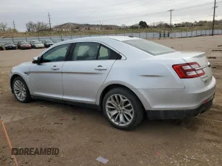 2013 Ford Taurus Limited with VIN 1FAHP2F82DG235526, listed as a Copart auction lot 52051365 with 106,459 mi miles and Salvage Title. Bid and sale history available at DreamBid. Image 2.