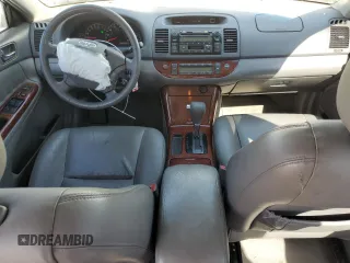 2006 Toyota Camry LE z VIN 4T1BF32K46U113289, wystawiony jako Copart lot #52558135 z przebiegiem 213 000 mil mil oraz Szkoda całkowita • Salvage title. Historia ofert i sprzedaży dostępna na DreamBid. Obrazek 8.