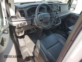 2023 Ford Transit Cargo with VIN 1FTBR2X88PKB38261, listed as a Copart auction lot 70617654 with 1,088 mi miles and Salvage Title. Bid and sale history available at DreamBid. Image 8.