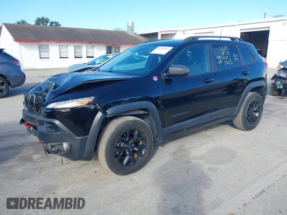 2018 Jeep Cherokee Trailhawk with VIN 1C4PJMBX3JD546332, listed as a IAAI auction lot 41269245 with 88,466 mi miles. Bid and sale history available at carsss.com. Image 2.
