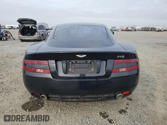 2005 Aston Martin DB9 z VIN SCFAD01A05GA01135, wystawiony jako Copart lot #47689715 z przebiegiem Nie podano mil oraz Tytuł czysty. Historia ofert i sprzedaży dostępna na DreamBid. Obrazek 6.