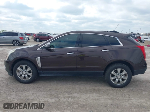 2015 Cadillac SRX Luxury Collection z VIN 3GYFNBE35FS597538, wystawiony jako IAAI lot #42056002 z przebiegiem 49 483 mil mil oraz . Historia ofert i sprzedaży dostępna na DreamBid. Obrazek 14.