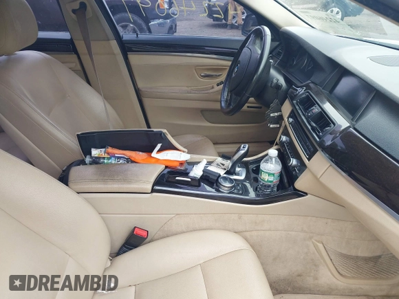 2014 BMW 5 Series 535i xDrive with VIN WBA5B3C57ED538801, listed as a IAAI auction lot 42246097 with 170,219 mi miles and . Bid and sale history available at DreamBid. Image 5.