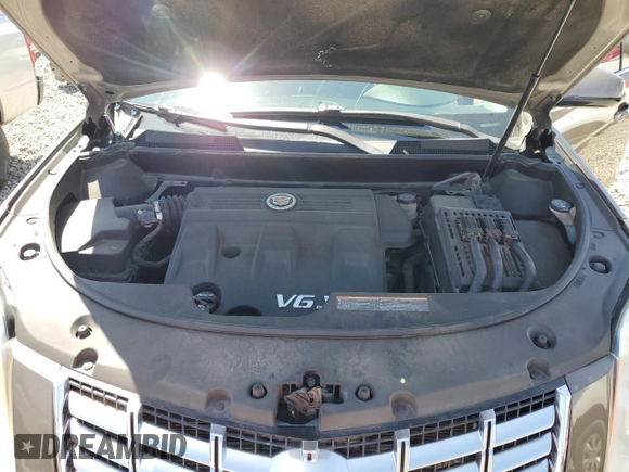 2015 Cadillac SRX Luxury Collection z VIN 3GYFNBE35FS555046, wystawiony jako Copart lot #57589155 z przebiegiem 108 456 mil mil oraz Szkoda całkowita • Salvage title. Historia ofert i sprzedaży dostępna na DreamBid. Obrazek 12.