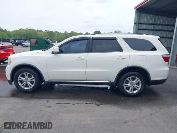 2012 Dodge Durango Crew with VIN 1C4RDHDG9CC152766, listed as a IAAI auction lot 42038931 with 288,545 mi miles and . Bid and sale history available at DreamBid. Image 14.