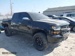 2018 Chevrolet Silverado 1500 Custom with VIN 3GCUKPEC4JG552699, listed as a IAAI auction lot 41774257 with 131,916 mi miles. Bid and sale history available at carsss.com. Image 1.