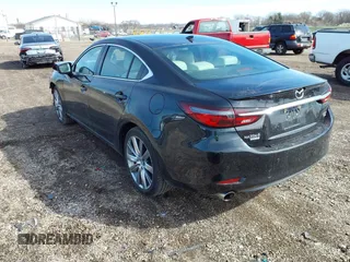 2021 Mazda 6 Signature with VIN JM1GL1XY7M1615149, listed as a IAAI auction lot 41851158 with 47,690 mi miles and . Bid and sale history available at DreamBid. Image 3.