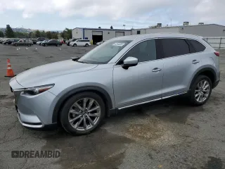 2016 Mazda CX-9 Grand Touring with VIN JM3TCBDY0G0112198, listed as a Copart auction lot 62544865 with 77,184 mi miles and Salvage title. Bid and sale history available at DreamBid. Image 1.