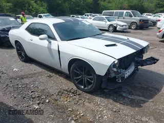 2016 Dodge Challenger SXT with VIN 2C3CDZAG4GH131542, listed as a IAAI auction lot 42188500 with 114,446 mi miles and . Bid and sale history available at DreamBid. Image 1.