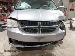 2014 Dodge Grand Caravan SXT z VIN 2C4RDGCGXER263963, wystawiony jako IAAI lot #41956264 z przebiegiem 138 815 mil mil oraz . Historia ofert i sprzedaży dostępna na DreamBid. Obrazek 6.