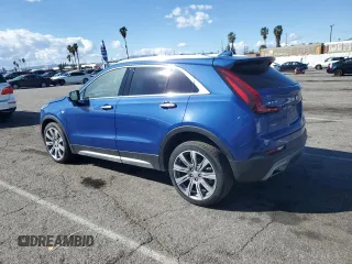 2023 Cadillac XT4 AWD Premium Luxury z VIN 1GYFZDR44PF206176, wystawiony jako Copart lot #46456445 z przebiegiem 3 896 mil mil oraz Szkoda całkowita • Salvage title. Historia ofert i sprzedaży dostępna na DreamBid. Obrazek 2.