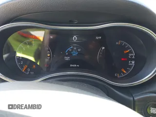 2021 Jeep Grand Cherokee Freedom with VIN 1C4RJFAG0MC856308, listed as a IAAI auction lot 42050995 with 35,428 mi miles and . Bid and sale history available at DreamBid. Image 7.