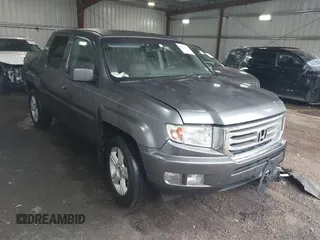 2012 Honda Ridgeline RTL with VIN 5FPYK1F58CB002453, listed as a IAAI auction lot 42501732 with 218,388 mi miles and . Bid and sale history available at DreamBid. Image 1.