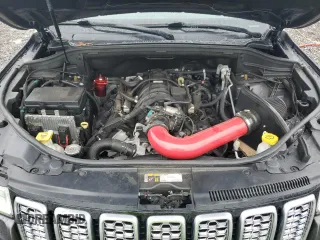 2017 Jeep Grand Cherokee Summit with VIN 1C4RJFJT1HC818136, listed as a Copart auction lot 81057084 with 135,843 mi miles and Salvage title. Bid and sale history available at DreamBid. Image 12.
