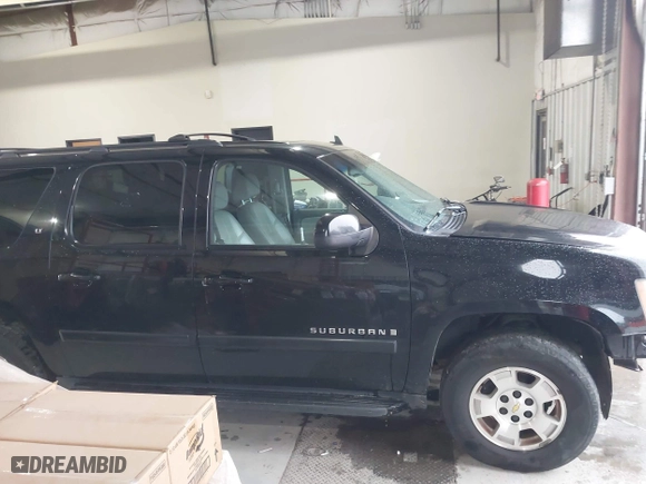 2007 Chevrolet Suburban LT with VIN 3GNFC16067G318779, listed as a IAAI auction lot 41560427 with 209,104 mi miles. Bid and sale history available at carsss.com. Image 14.