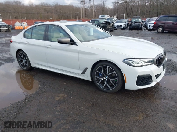 2021 BMW 5 Series M550i xDrive z VIN WBA13BK09MCF05866, wystawiony jako IAAI lot #41574859 z przebiegiem 37 822 mil mil oraz . Historia ofert i sprzedaży dostępna na DreamBid. Obrazek 1.