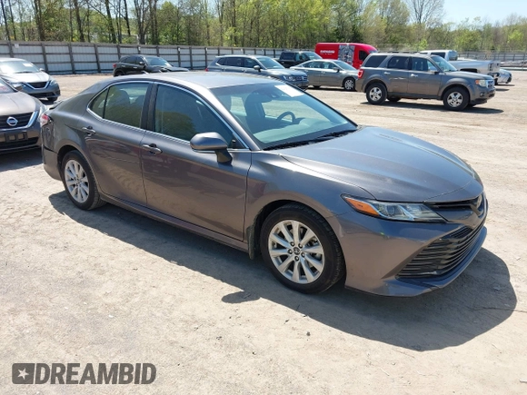 2019 Toyota Camry LE with VIN 4T1B11HK8KU289721, listed as a IAAI auction lot 42021107 with 69,828 mi miles and . Bid and sale history available at DreamBid. Image 1.
