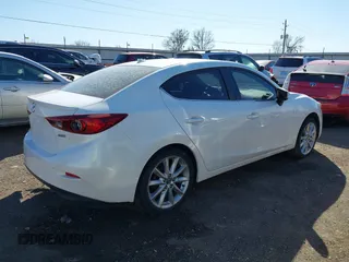 2017 Mazda 3 Grand Touring z VIN 3MZBN1W34HM139393, wystawiony jako IAAI lot #41747788 z przebiegiem 137 275 mil mil oraz . Historia ofert i sprzedaży dostępna na DreamBid. Obrazek 4.