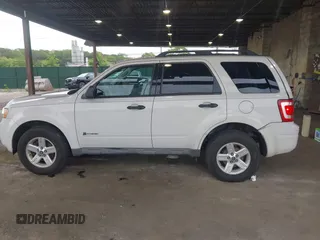 2009 Ford Escape Hybrid with VIN 1FMCU59399KC34999, listed as a IAAI auction lot 42515815 with 201,130 mi miles and . Bid and sale history available at DreamBid. Image 14.