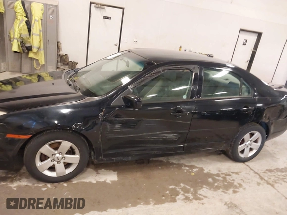 2007 Ford Fusion SE with VIN 3FAHP07147R177289, listed as a IAAI auction lot 41953287 with 218,656 mi miles. Bid and sale history available at carsss.com. Image 6.