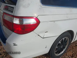 2007 Honda Odyssey Touring с VIN 5FNRL38897B088701, выставлен на аукционе IAAI как лот 41077802 с пробегом 235 821 миль миль и . История ставок и продаж доступна на DreamBid. Изображение 6.