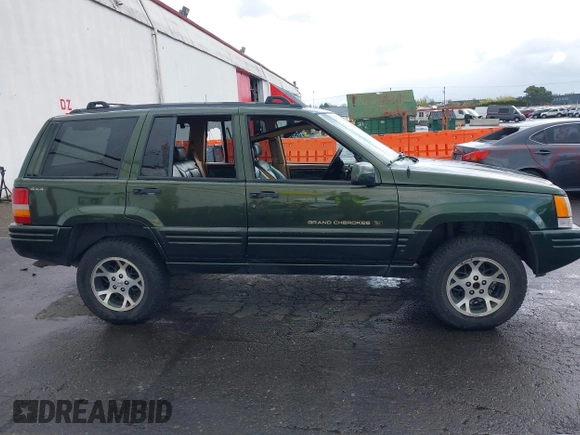 1996 Jeep Grand Cherokee Limited with VIN 1J4GZ78S0TC235692, listed as a IAAI auction lot 41945617 with Not provided miles and . Bid and sale history available at DreamBid. Image 13.