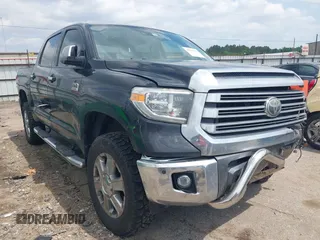 2020 Toyota Tundra Platinum with VIN 5TFAY5F19LX911658, listed as a IAAI auction lot 42127578 with 169,633 mi miles and . Bid and sale history available at DreamBid. Image 1.