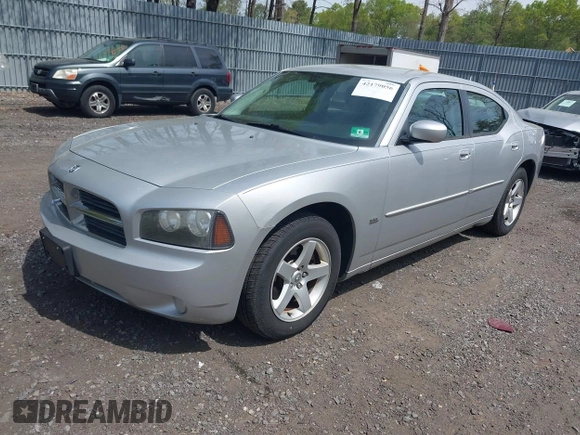 2010 Dodge Charger SXT with VIN 2B3CA3CV8AH277058, listed as a IAAI auction lot 42179056 with 162,971 mi miles. Bid and sale history available at carsss.com. Image 2.
