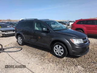 2016 Dodge Journey SE with VIN 3C4PDCAB4GT249709, listed as a Copart auction lot 52209685 with 143,923 mi miles and Salvage Title. Bid and sale history available at carsss.com. Image 4.