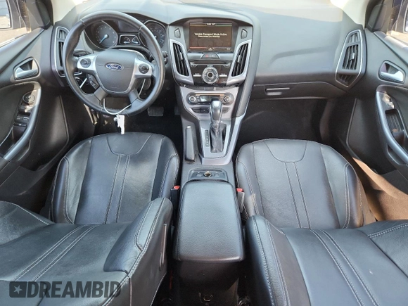 2014 Ford Focus Titanium with VIN 1FADP3N21EL274263, listed as a Copart auction lot 64017905 with 211,775 mi miles and Clean title. Bid and sale history available at DreamBid. Image 8.