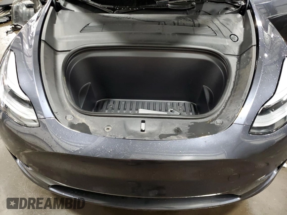 2024 Tesla Model Y Long Range with VIN 7SAYGDEE6RA253946, listed as a Copart auction lot 46699445 with 6,008 mi miles and Salvage Title. Bid and sale history available at DreamBid. Image 13.