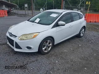 2014 Ford Focus SE z VIN 1FADP3K27EL323874, wystawiony jako IAAI lot #42131316 z przebiegiem 140 815 mil mil oraz . Historia ofert i sprzedaży dostępna na DreamBid. Obrazek 2.
