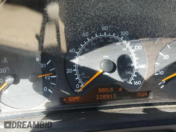 1998 Mercedes-Benz E 320 with VIN WDBJF25F3WA578364, listed as a Copart auction lot 77551834 with 228,913 mi miles and Salvage Title. Bid and sale history available at DreamBid. Image 9.